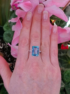 14K Emerald Cut Blue Topaz Ring